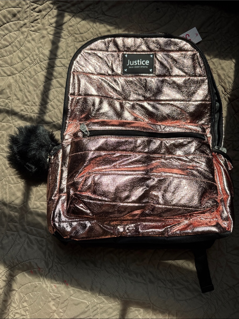 Justice Metallic Rose Gold Backpack with Black Pom